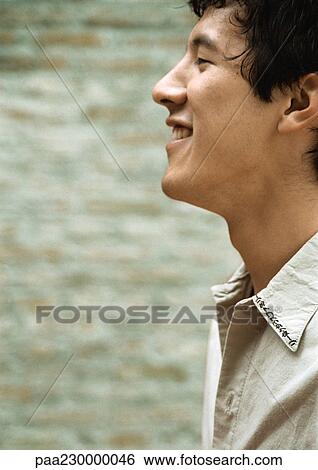 Man smiling, profile. View Large Photo Image Stock Photograph - Man smiling, profile.. Fotosearch