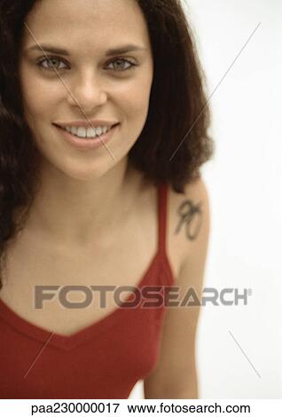 Woman smiling at camera, portrait. View Large Photo Image Stock Photo - Woman smiling at camera, portrait.. Fotosearch