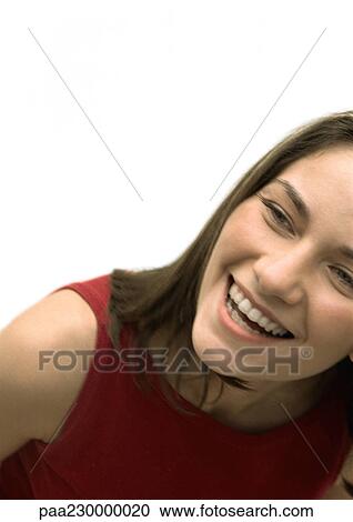 Woman smiling leaning forward, portrait. View Large Photo Image Stock Image - Woman smiling leaning forward, portrait.. Fotosearch
