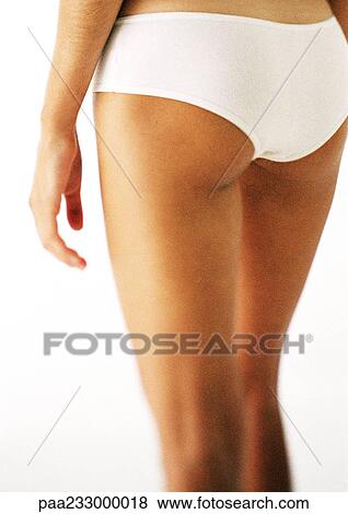 Download Woman standing in underwear, lower section, rear view ...