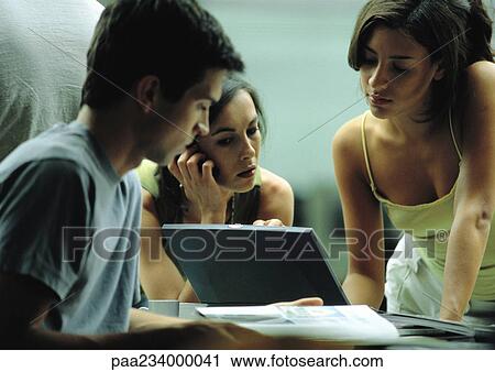 Group of people working on laptop. View Large Photo Image Stock Image - Group of people working on laptop.. Fotosearch