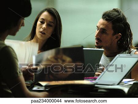 Men and women working together. View Large Photo Image Picture - Men and women working together.. Fotosearch