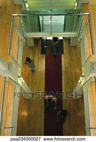 People walking inside building, view from above. View Large Photo Image Stock Photo - People walking inside building, view from above.. Fotosearch