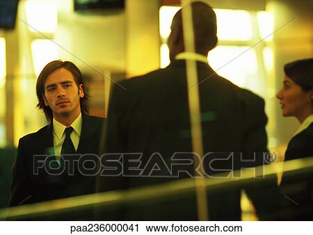 Business people standing together View Large Photo Image Stock Image - Business people standing together. Fotosearch
