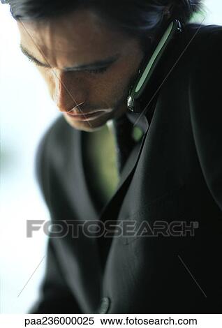 Businessman talking on cell phone, close up. View Large Photo Image Stock Photography - Businessman talking on cell phone, close up.. Fotosearch