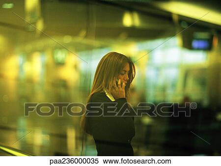 Businesswoman talking on cell phone. View Large Photo Image Stock Photography - Businesswoman talking on cell phone.. Fotosearch