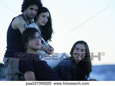 Two young couples, outdoors View Large Photo Image Stock Image - Two young couples, outdoors. Fotosearch