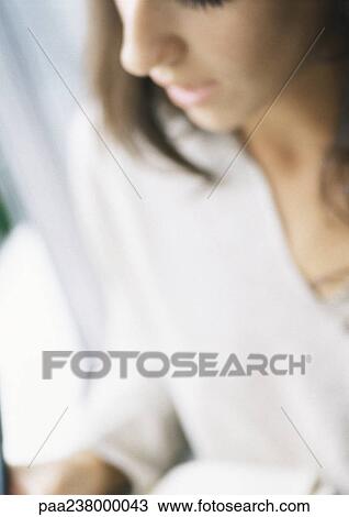 Stock Image - Woman, close-up, blurred. Fotosearch