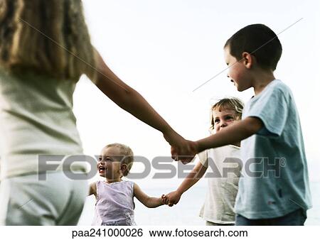 Children walking in a ring, low angle view View Large Photo Image Stock Photograph - Children walking in a ring, low angle view. Fotosearch