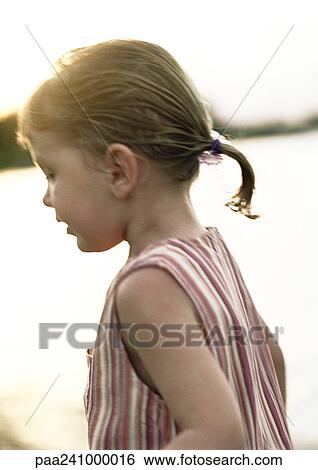 Girl with ponytail, side view View Large Photo Image Stock Photograph - Girl with ponytail, side view. Fotosearch