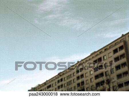 Stock Photo - Apartment building, low angle view. Fotosearch