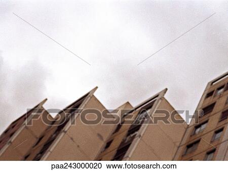 Apartment buildings, low angle view View Large Photo Image Stock Image - Apartment buildings, low angle view. Fotosearch