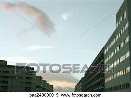 Stock Photo - Apartment buildings, low angle view. Fotosearch