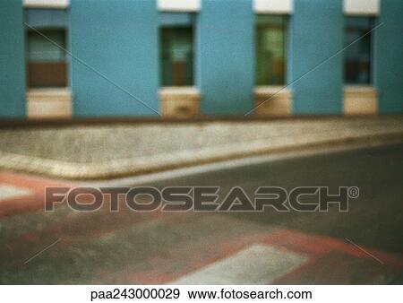 Stock Photo - Crosswalk and curb, blurred. Fotosearch