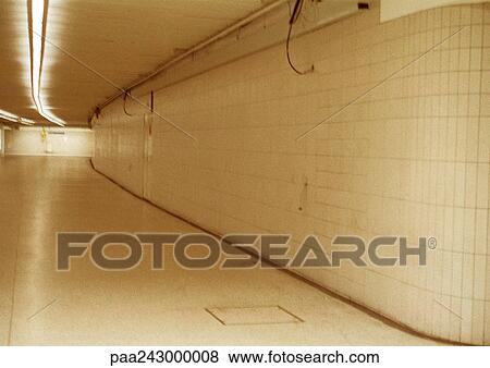 Stock Photo - Empty subterranean corridor. Fotosearch