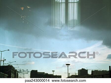 Roofline and reflection of window View Large Photo Image Picture - Roofline and reflection of window. Fotosearch
