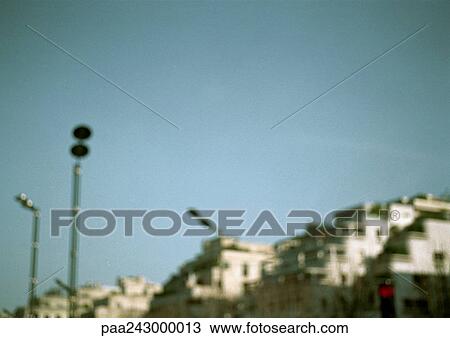Street lamps and apartment buildings, blurred View Large Photo Image Stock Image - Street lamps and apartment buildings, blurred. Fotosearch