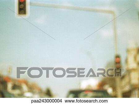 Traffic light, low angle view, blurred View Large Photo Image Picture - Traffic light, low angle view, blurred. Fotosearch
