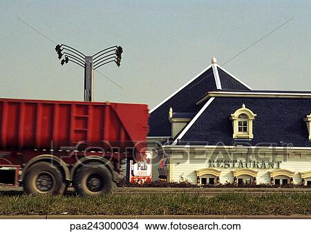 Truck in front of restaurant View Large Photo Image Picture - Truck in front of restaurant. Fotosearch