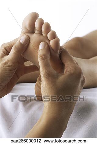 Foot massage, close-up View Large Photo Image Stock Image - Foot massage, close-up. Fotosearch