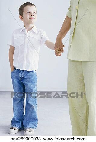 Boy holding grandfather's hand View Large Photo Image Stock Photo - Boy holding grandfather's hand. Fotosearch