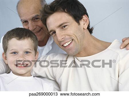 Boy with father and grandfather View Large Photo Image Stock Image - Boy with father and grandfather. Fotosearch