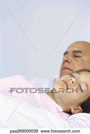 Girl sleeping with grandfather View Large Photo Image Stock Photo - Girl sleeping with grandfather. Fotosearch