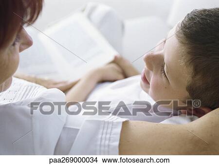 Grandmother reading to boy View Large Photo Image Picture - Grandmother reading to boy. Fotosearch