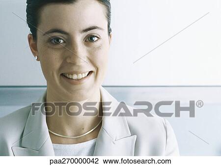 Businesswoman smiling at camera, close-up View Large Photo Image Stock Image - Businesswoman smiling at camera, close-up. Fotosearch