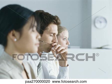 Three businesspeople lined up, two with eyes closed, head and shoulders, side view View Large Photo Image Stock Image - Three businesspeople lined up, two with eyes closed, head and shoulders, side view. Fotosearch