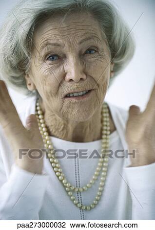Stock Image - Senior woman, portrait. Fotosearch