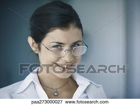 Woman wearing glasses, portrait View Large Photo Image Stock Photo - Woman wearing glasses, portrait. Fotosearch