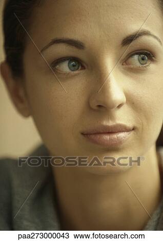 Stock Image - Young woman, portrait. Fotosearch