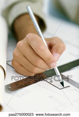 Hand drawing on blueprints View Large Photo Image Stock Image - Hand drawing on blueprints. Fotosearch