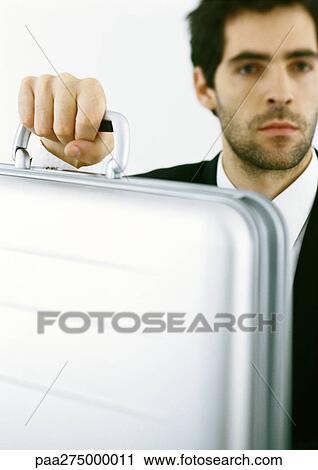 Man with stubble holding briefcase View Large Photo Image Stock Image - Man with stubble holding briefcase. Fotosearch