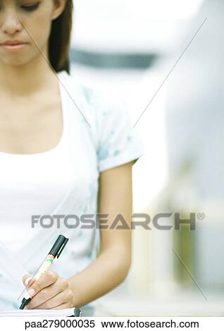 Female student writing, partial view View Large Photo Image Stock Photography - Female student writing, partial view. Fotosearch