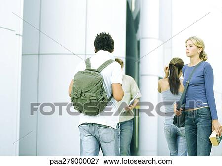 Students standing near building View Large Photo Image Stock Photo - Students standing near building. Fotosearch