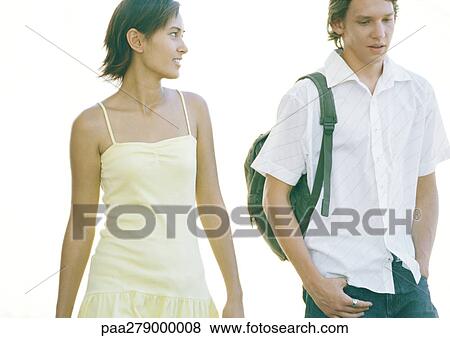 Stock Photo - Two students walking side by side. Fotosearch