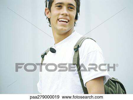 Young man smiling View Large Photo Image Stock Photo - Young man smiling. Fotosearch