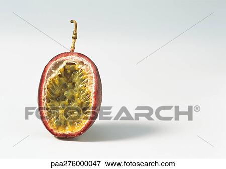 Passion fruit half View Large Photo Image Stock Photo - Passion fruit half. Fotosearch