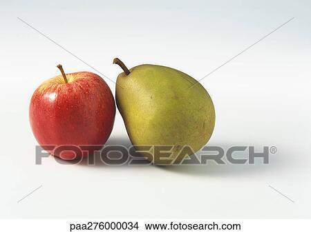 Pear and red apple View Large Photo Image Picture - Pear and red apple. Fotosearch