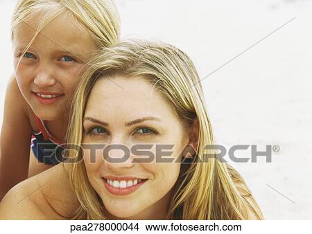 Picture - Girl and mother on beach, portrait. Fotosearch