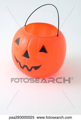 Jack O'Lantern bucket View Large Photo Image Stock Photography - Jack O'Lantern bucket. Fotosearch