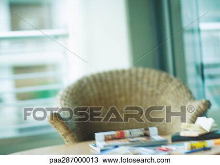 Wicker chair at desk View Large Photo Image Stock Image - Wicker chair at desk. Fotosearch
