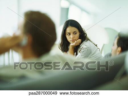 Young adults sitting together View Large Photo Image Stock Photo - Young adults sitting together. Fotosearch