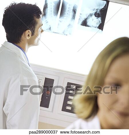 Doctors in x-ray lab View Large Photo Image Stock Photo - Doctors in x-ray lab. Fotosearch