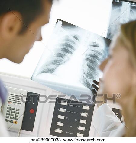 Doctors in x-ray lab View Large Photo Image Stock Photo - Doctors in x-ray lab. Fotosearch