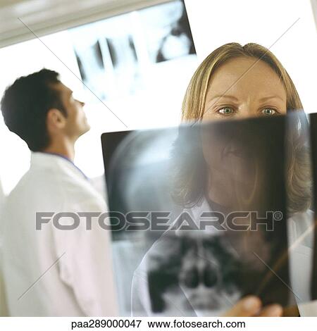 Stock Photo - Doctors in x-ray lab. Fotosearch