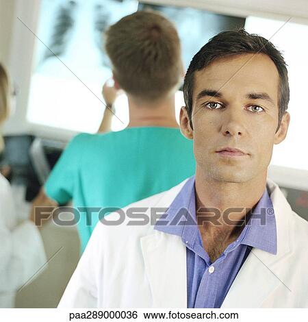 Doctors in x-ray lab View Large Photo Image Stock Photograph - Doctors in x-ray lab. Fotosearch