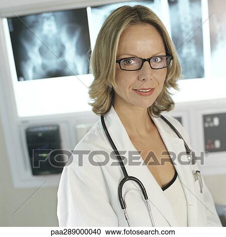 Female doctor in x-ray lab View Large Photo Image Stock Image - Female doctor in x-ray lab. Fotosearch